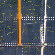 After in space repairs to the Hubble Space Telescope, the returned parts show many 
									orbital debris impacts. Credit: NASA.