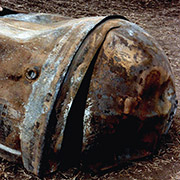 This is the main propellant tank of the second stage of a Delta 2 launch vehicle which 
									landed near Georgetown, TX, on 22 January 1997. This approximately 250 kg tank is primarily 
									a stainless steel structure and survived reentry relatively intact. Credit: NASA ODPO.